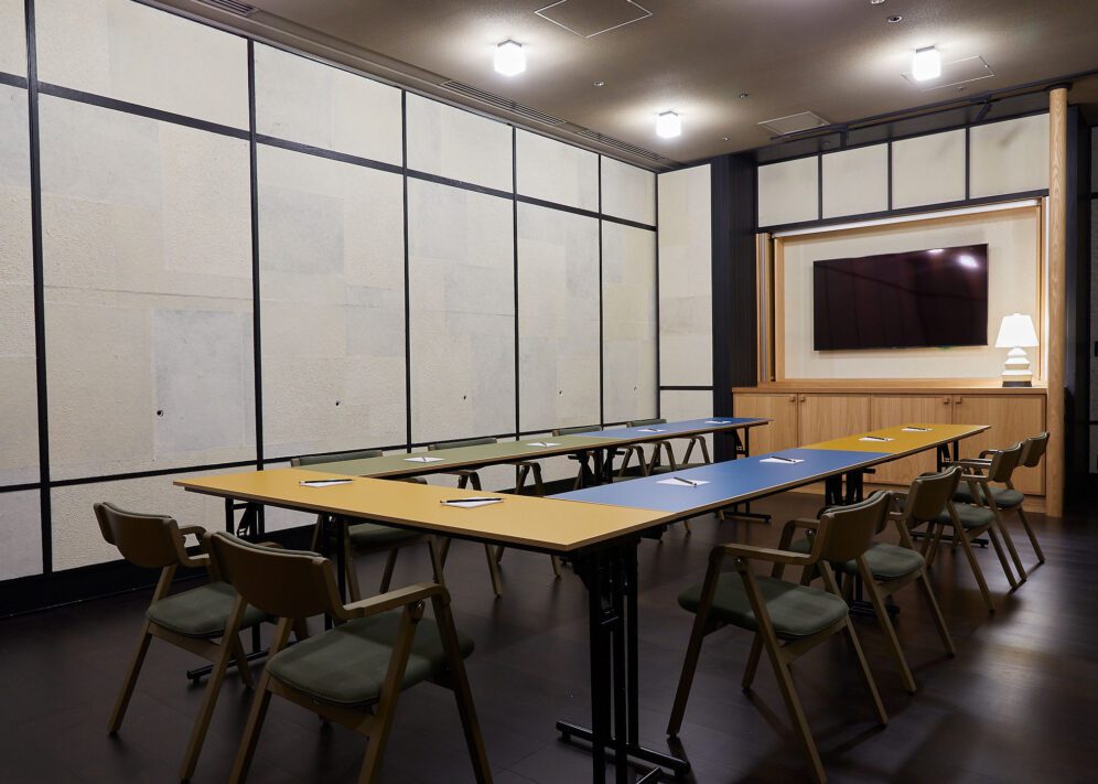 An intimate venue connected to other larger venues provides a space for changing or organizing