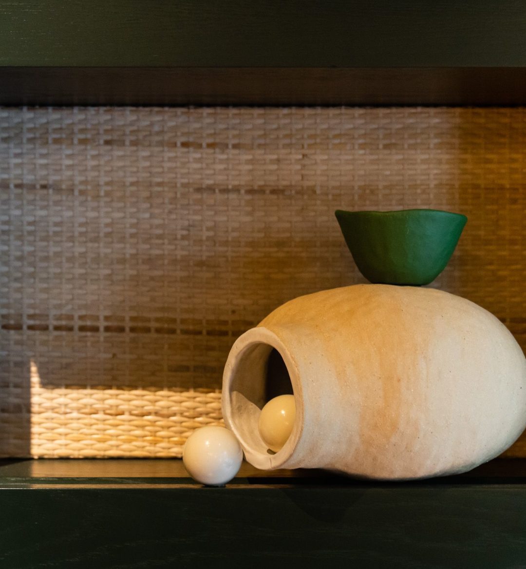 ceramic artwork in gallery wall